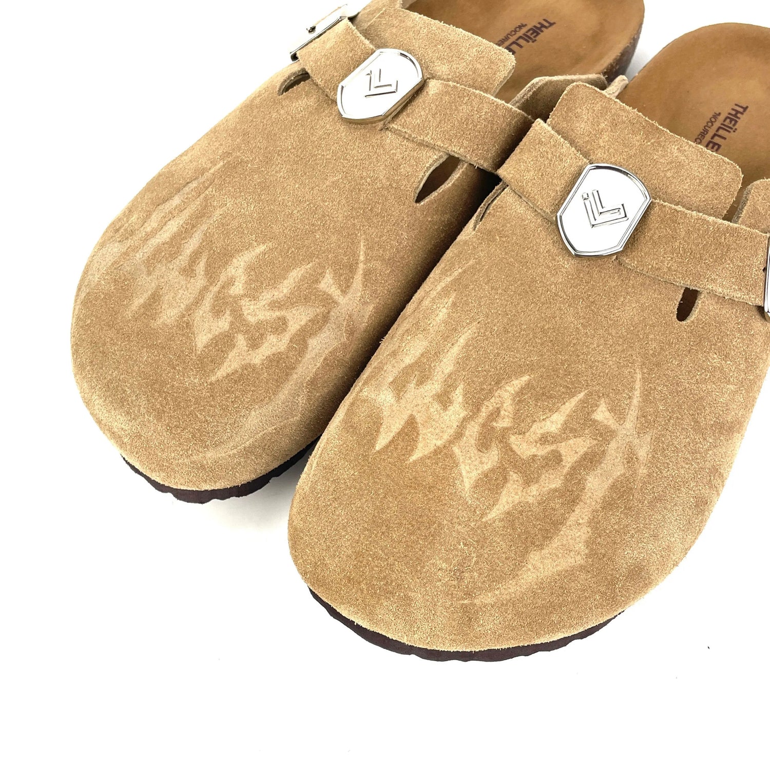 TAN ILL-CLOGS